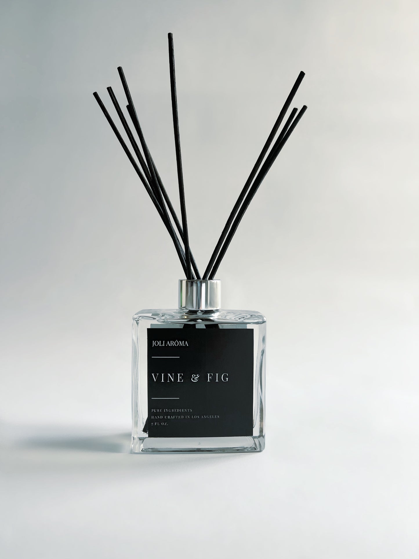 vine fig reed diffuser in glass bottle